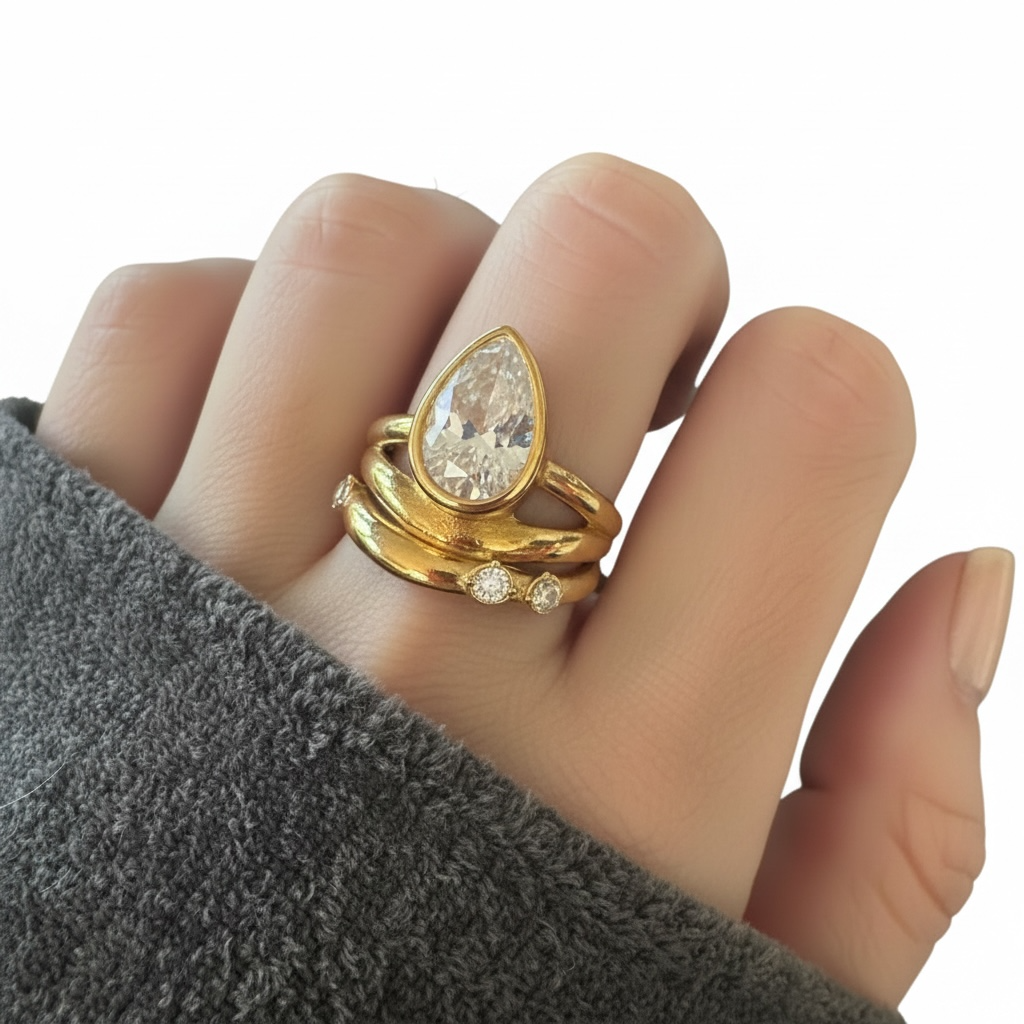 Yellow Gold Band Tear Shape Cubic Zirconium