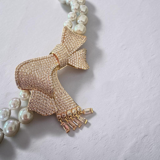 Pearl & Large Cubic Zirconium Bow Pendant Necklace